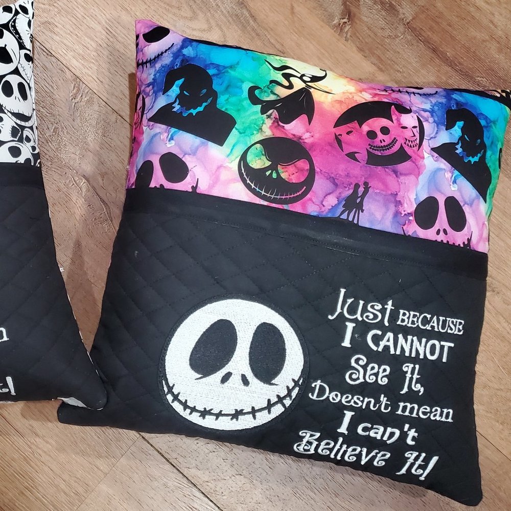 Jack Skellinton Multi Color Reading Pocket Pillow.  16"x16"